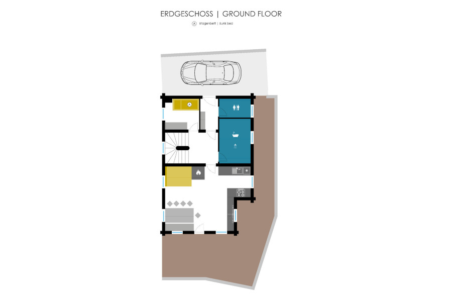 Grundriss des Erdgeschosses der Family Lodge Maximilian mit Wohnbereich, Küche, Schlafzimmer, Badezimmer, WC, Carport und Terrasse.